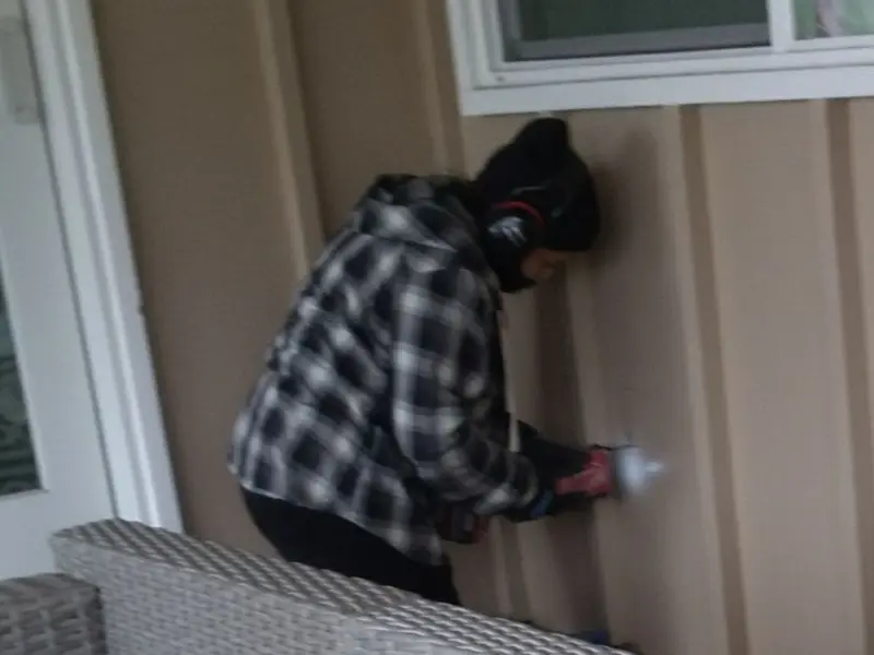 Professional electrician installing an exterior outlet in Kittery