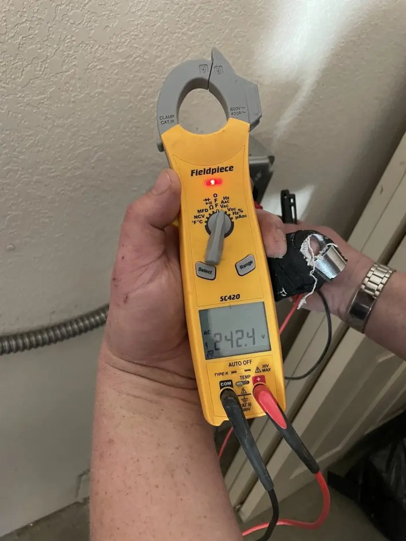 Voltage testing with clamp meter during Recessed Lighting Installation in Kittery